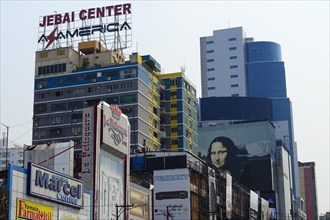 Advertising signs on high-rise facades