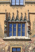 Window with two electoral sculptures