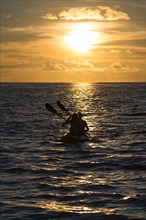 Canoe at sunset