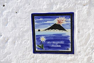 Stromboli volcano as motif on house sign