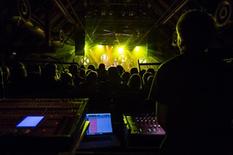 View from the mixer on concert goers and stage