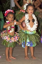 Little girls decorated with flowers