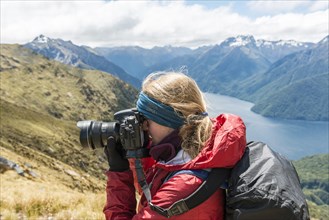 Young woman taking a picture