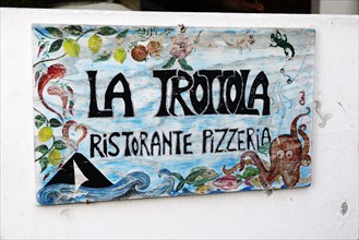 Stromboli volcano as motif on pizzeria advertising sign