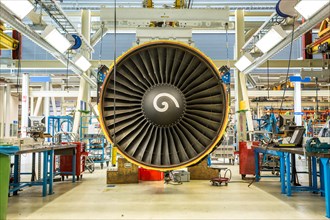 Aircraft engine's maintenance in huge industrial hall