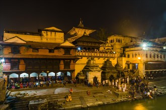 Pashupatinath temple with people at gaths