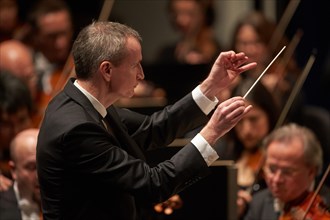 Conductor Garry Walker conducts the State Orchestra