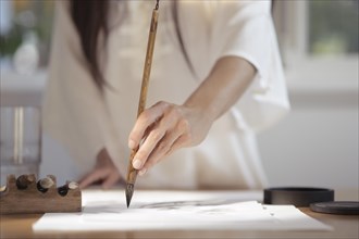 Woman Japanese sumi-e artist