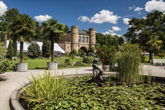 Water lily basin in front of the arched building