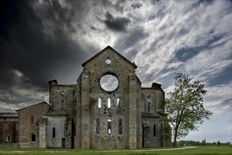 Dark clouds over the ruins of the former Cistercian Abbey of San Galgano