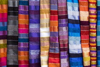 Colorful striped cloths for sale at the street stall