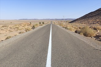 Straight road in a dry landscape