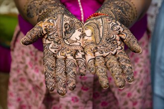 Close up of mehendi on bride's hand