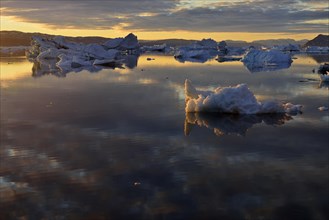 View over the icebergs at midnight sun