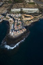Fishing village La Caleta with apartments and hotels