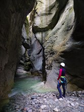 Woman canyoning in the Tauglbach Gorge