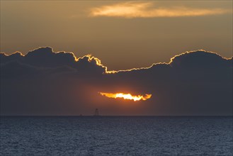 Sunset with dark clouds over the Baltic Sea
