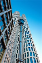 Lantern in front of skyscraper Upper West