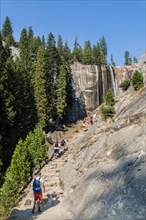 Young man on hiking trail to Vernal Fall