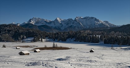 Frozen Lake Geroldsee in winter in front of Karwendel Mountains