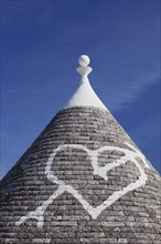 Round slate roof with heart