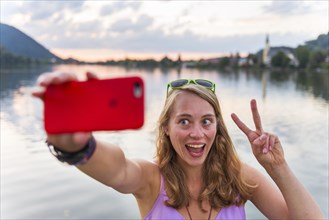Young woman taking selfie