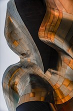 Copper coloured curved facade of the Museum of Pop Culture