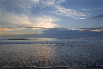Rising tide at dusk
