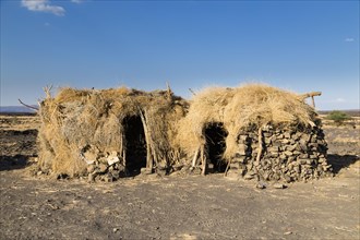 Huts in the Afar settlement at the foot of the active volcano Erta Ale