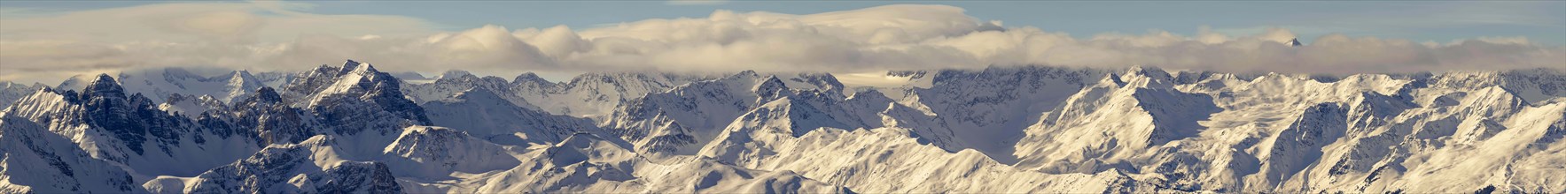 Panorama of the snow-covered Alpine range in winter