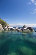 Turquoise clear water and granite rocks