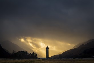 Loch Shiel with Glenfinnan Monument under threatening cloudy sky