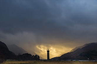 Loch Shiel with Glenfinnan Monument under threatening cloudy sky