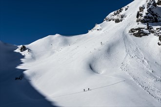 Ski tourers in ascent