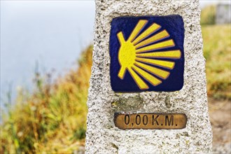 Zero kilometer marker showing the end of the Pilgrimage Camino of Finisterre