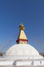 Buddhist stupa with prayer flags