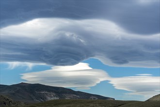 Lenticularis clouds over the mountains at Lago Viedma