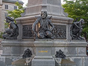 Figures at the base of Paul Chomedey de Maisonneuve memorial