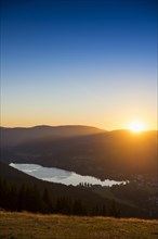 View from Hochfirst to Lake Titisee and Feldberg mountain at sunset