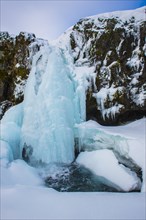 Frozen waterfall Kirkjufellsfoss