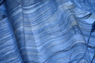 Rock formation folded blue marble