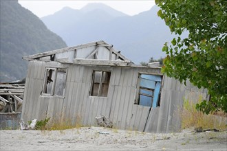 Destroyed house during volcanic eruption of Chaiten volcano in 2008