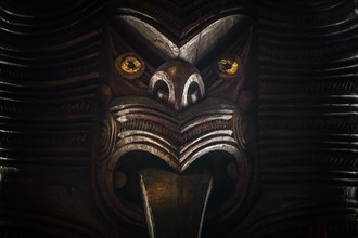 Traditionally carved Maori figure