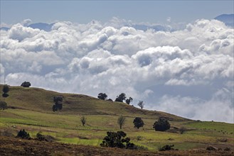View from the southern slope of Irazu Volcano to the cultural landscape and cloud cover