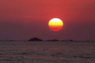 Red glowing sunset over the sea