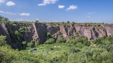Disused quarry with tents