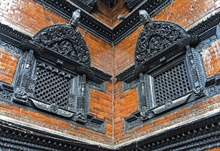 Artfully carved window grilles in traditional Newar style in Kumari Chowk inner courtyard
