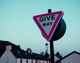 Street Sign Give way in the evening