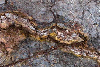 Various colorful rock layers in the rock