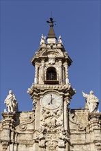Baroque facade and tower of the church Real Iglesia de los Santos Juanes